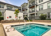 Thumbnail 52 of 81 - our apartments offer a swimming pool in front of our building at Ainsworth, Virginia, 23228