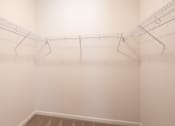 Thumbnail 31 of 35 - a room with white walls and wire racks on the ceiling
