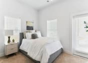 Thumbnail 15 of 19 - Bed in bedroom at Bay Pointe at Summerville, Summerville