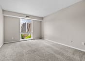 Thumbnail 41 of 52 - Carpeted Living Area at Bayville Apartments, Virginia Beach, Virginia