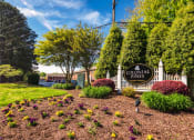 Thumbnail 2 of 16 - an image of the colonial pines sign in front of the property
