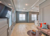 Thumbnail 35 of 42 - a living room with a couch and a coffee table at The Bella at Westchester, Midlothian