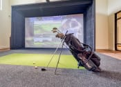 Thumbnail 66 of 81 - a golf club and balls on the carpet in front of a screen at Ainsworth, Richmond