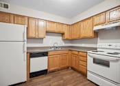 Thumbnail 23 of 33 - the preserve at ballantyne commons apartment kitchen with white appliances