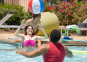 Thumbnail 4 of 60 - women playing volley in a swimming pool at Proximity at ODU in Norfolk, VA 23508
