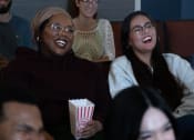 Thumbnail 31 of 60 - two women laughing in the cinema at Proximity at ODU in Norfolk, VA 23508