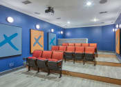 Thumbnail 29 of 60 - theater room with seating and projector at Proximity at ODU, Norfolk