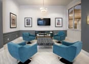Thumbnail 22 of 46 - a living room filled with furniture and a flat screen tv