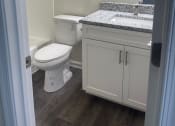 Thumbnail 76 of 78 - a small bathroom with a toilet and a sink