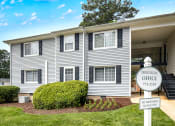 Thumbnail 22 of 27 - Exterior of leasing office at Tryon Village Apartments