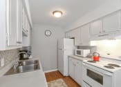 Thumbnail 25 of 27 - Kitchen at Tryon Village Apartments