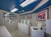 Thumbnail 7 of 16 - Woodbury Park Apartments laundry 3