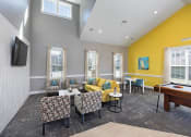 Thumbnail 11 of 32 - a living room with couches and chairs and a pool table at Addison Crater Woods, Virginia, 23805