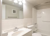 Thumbnail 16 of 16 - this is a photo of the bathroom in a 1 bedroom apartment at deer hill apartments in c