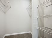 Thumbnail 24 of 44 - a walk in closet in a 555 waverly unit at Wendover River Oaks, North Carolina, 27409