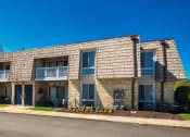 Thumbnail 18 of 52 - a building with a street in front of it  at Bayville Apartments, Virginia Beach, VA, 23455