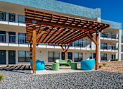 Thumbnail 17 of 31 - Wooden pergola at Peaks at Sandia View, Albuquerque, NM
