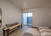 Thumbnail 11 of 31 - Room with bench and Sliding Glass Door at Peaks at Sandia View, New Mexico, 87102
