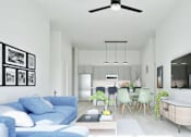 Thumbnail 12 of 17 - A living room with a blue couch and a television on the wall.