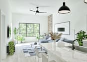Thumbnail 15 of 17 - A modern kitchen with a marble countertop and a ceiling fan.