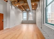 Thumbnail 2 of 22 - Room with white brick walls at Shorehaus Lofts Apartments, Cleveland