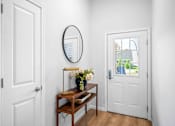 Thumbnail 1 of 33 - A white door is on the left and a white door is on the right.