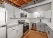 Thumbnail 11 of 22 - Gourmet Kitchen With Island at Shorehaus Lofts Apartments, Ohio