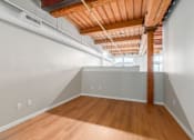 Thumbnail 14 of 22 - Room with wooden floors at Shorehaus Lofts Apartments, Cleveland