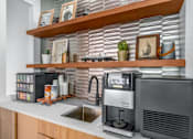 Thumbnail 9 of 22 - Clubhouse kitchen at Shorehaus Lofts Apartments, Cleveland, OH