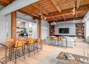 Thumbnail 5 of 22 - Living room with a wooden ceiling at Shorehaus Lofts Apartments, Cleveland