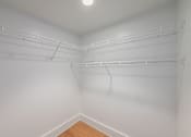 Thumbnail 17 of 22 - Empty white walk in closet at Shorehaus Lofts Apartments, Ohio, 44113