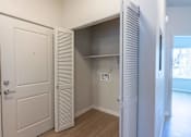Thumbnail 20 of 51 - A white door is open to a small closet with shelves at Cascade Place Apartment Homes, Molalla