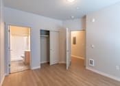 Thumbnail 22 of 51 - A room with a wooden floor and white walls at Cascade Place Apartment Homes, Oregon, 97038