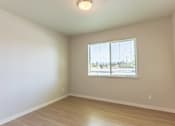 Thumbnail 39 of 51 - Empty room with a window at Cascade Place Apartment Homes, Molalla, OR, 97038