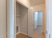 Thumbnail 46 of 51 - A white interior with a doorway leading to another room at Cascade Place Apartment Homes, Molalla, 97038
