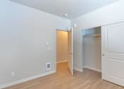 Thumbnail 49 of 51 - A room with a white door and a white wall at Cascade Place Apartment Homes, Molalla, Oregon