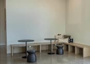 Thumbnail 5 of 25 - A room with a table and a bench at Northplace Apartment Homes, Oregon, 97305