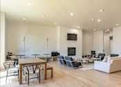 Thumbnail 8 of 25 - A modern living room with a fireplace and a television at Northplace Apartment Homes, Salem, 97305