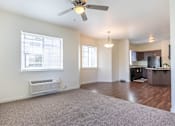 Thumbnail 16 of 72 - A room with a ceiling fan and a window with blinds at Riverplace Apartment Homes, Independence, OR, 97351