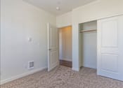 Thumbnail 22 of 72 - A room with a white door and a window at Riverplace Apartment Homes, Independence, 97351