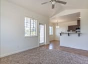 Thumbnail 35 of 72 - A spacious room with a ceiling fan and a window at Riverplace Apartment Homes, Oregon, 97351