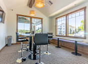 Thumbnail 50 of 72 - A room with a table and chairs and a window at Riverplace Apartment Homes, Independence, OR
