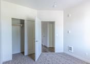 Thumbnail 2 of 28 - A room with a carpeted floor and white walls at Silverplace Apartment Homes, Oregon