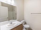 Thumbnail 5 of 28 - A white sink is on a countertop in a bathroom at Silverplace Apartment Homes, Silverton, Oregon
