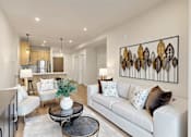 Thumbnail 20 of 24 - A modern living room with a white sofa and a large abstract painting on the wall.