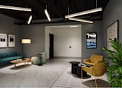 Thumbnail 5 of 8 - A modern living room with a blue couch, a yellow armchair, and a coffee table.