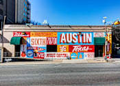 Thumbnail 16 of 16 - A building with a sign that says "Historic Austin" on it.