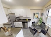 Thumbnail 4 of 13 - Gas Stoves and Quartz Countertops at The Regent Apartments, Brookline, Massachusetts, 02446