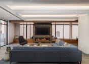 Thumbnail 17 of 27 - Resident club lounge with cozy fireplace at Nightingale, Providence, RI