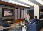 Thumbnail 16 of 27 - Resident club lounge with cozy fireplace at Nightingale, Providence, 02903,